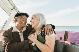 cheerful-senior-couple-enjoying-ferris-wheel-by-santa-monica-pier